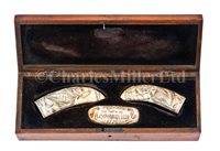 Lot 142 - Ø  A SET OF THREE SCRIMSHAW-DECORATED WHALES'...