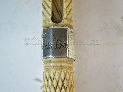 Lot 93 - Ø A RARE SILVER-MOUNTED MARINE IVORY CAGEWORK WALKING STICK, CIRCA 1898