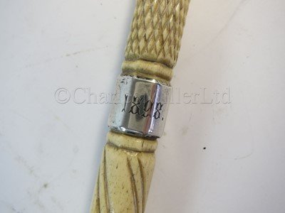 Lot 93 - Ø A RARE SILVER-MOUNTED MARINE IVORY CAGEWORK WALKING STICK, CIRCA 1898