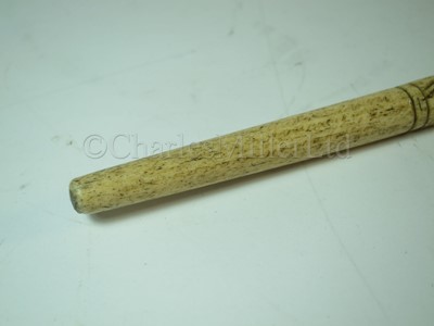 Lot 93 - Ø A RARE SILVER-MOUNTED MARINE IVORY CAGEWORK WALKING STICK, CIRCA 1898