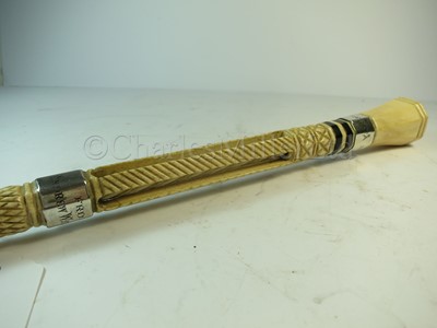 Lot 93 - Ø A RARE SILVER-MOUNTED MARINE IVORY CAGEWORK WALKING STICK, CIRCA 1898
