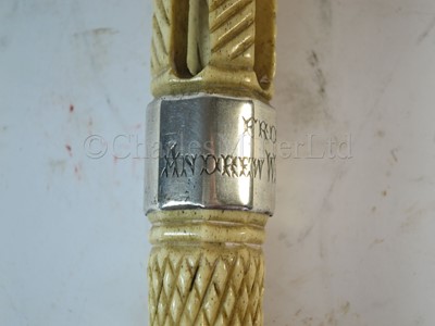 Lot 93 - Ø A RARE SILVER-MOUNTED MARINE IVORY CAGEWORK WALKING STICK, CIRCA 1898