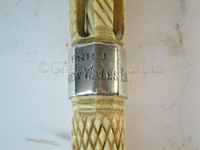 Lot 93 - Ø A RARE SILVER-MOUNTED MARINE IVORY CAGEWORK WALKING STICK, CIRCA 1898