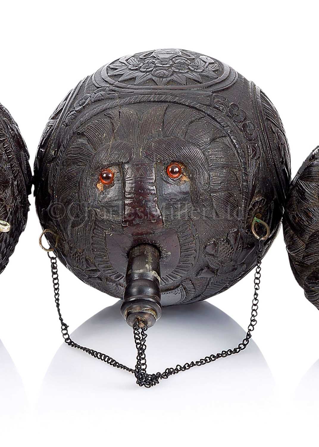 Lot 32 - A 19TH CENTURY CARVED COCONUT BUGBEAR