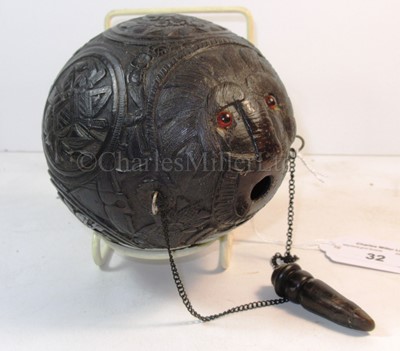 Lot 32 - A 19TH CENTURY CARVED COCONUT BUGBEAR