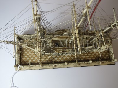 Lot 225 - AN ATTRACTIVE EARLY 19TH CENTURY FRENCH, NAPOLEONIC PRISONER OF WAR, BONE SHIP MODEL FOR A FIRST-RATE SHIP OF THE LINE