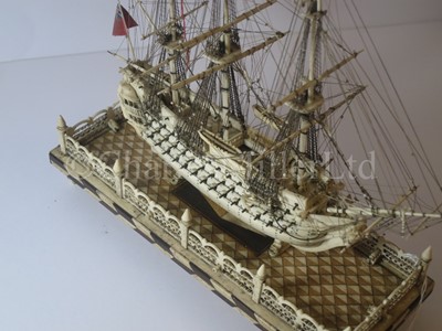 Lot 225 - AN ATTRACTIVE EARLY 19TH CENTURY FRENCH, NAPOLEONIC PRISONER OF WAR, BONE SHIP MODEL FOR A FIRST-RATE SHIP OF THE LINE