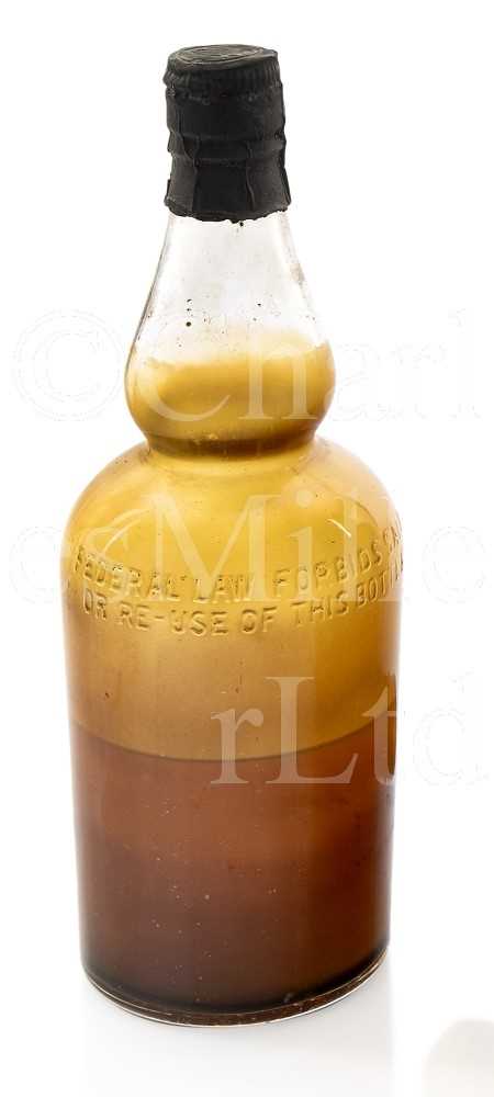 Lot 224 - A BOTTLE OF EXPORT WHISKY RECOVERED FROM THE S.S. POLITICIAN, WRECKED ISLE OF BARRA 1940, RECOVERED 1966