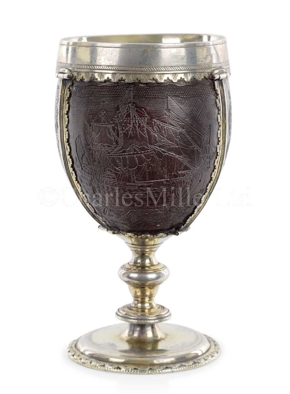 Lot 139 - AN EARLY 18TH CENTURY COCONUT CUP MOUNTED IN 17TH CENTURY 'PIRATE' SILVER