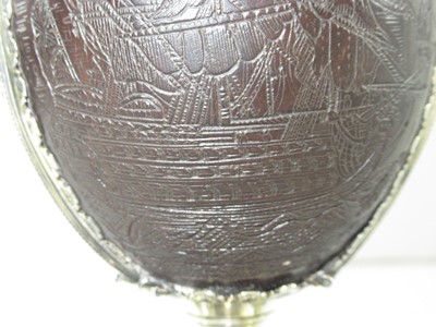 Lot 139 - AN EARLY 18TH CENTURY COCONUT CUP MOUNTED IN 17TH CENTURY 'PIRATE' SILVER