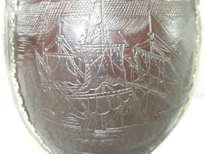 Lot 139 - AN EARLY 18TH CENTURY COCONUT CUP MOUNTED IN 17TH CENTURY 'PIRATE' SILVER
