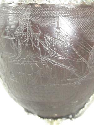 Lot 139 - AN EARLY 18TH CENTURY COCONUT CUP MOUNTED IN 17TH CENTURY 'PIRATE' SILVER