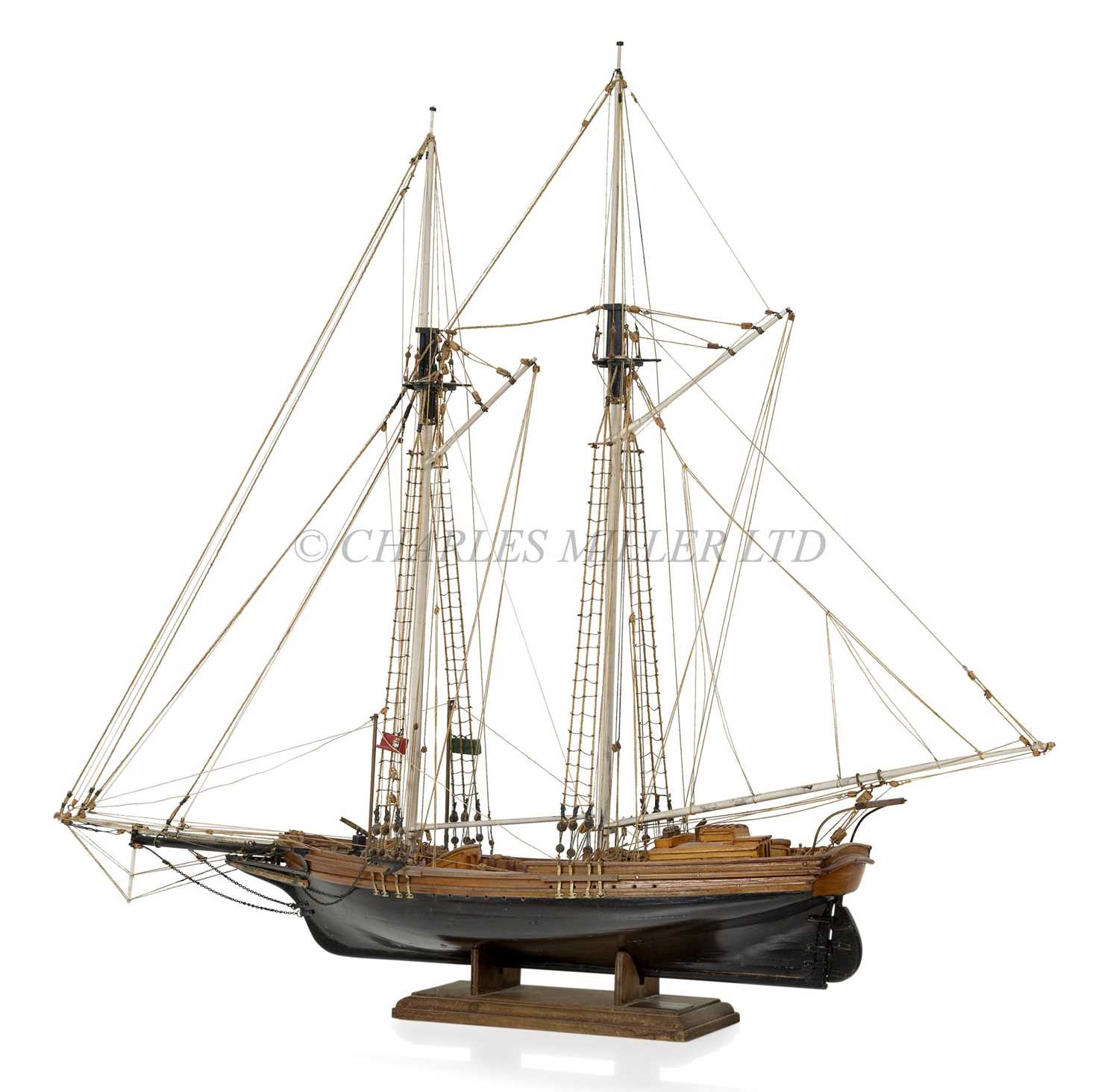 Lot 5 - A WELL-RIGGED MODEL OF A 19TH CENTURY TWIN-MASTED TRADING SCHOONER