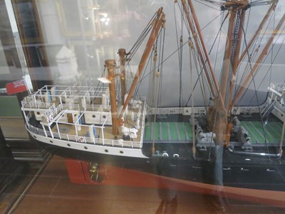 Lot 67 - A BUILDER'S-STYLE MODEL FOR THE ALFRED HOLT (BLUE FUNNEL) LINE PASSENGER-CARGO SHIP M.V. 'ANCHISES' [1947]