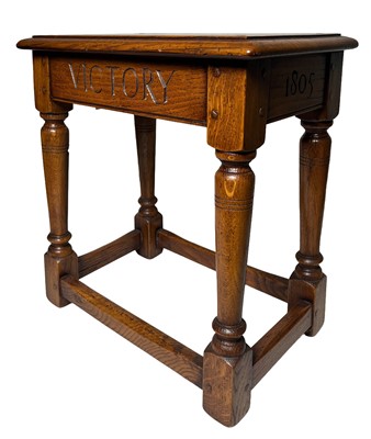 Lot 77 - A BICENTENARY OAK STOOL MADE FROM TIMBER FROM H.M.S. 'VICTORY', 2005