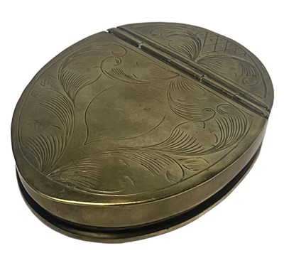 Lot 73 - A 19TH CENTURY COCONUT AND BRASS SNUFF BOX