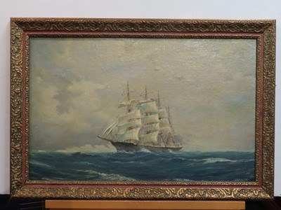 Lot 4 - O. LEGZDINS (1859-1914) A windjammer on a port reach; A wind jammer setting her topgallant sails