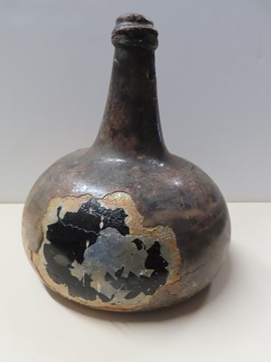 Lot 33 - A BOTTLE OF WINE FROM THE DUTCH EAST INDIAMAN 'VLIEGEND HERT', WRECKED IN THE SCHELDT ESTUARY, 1735