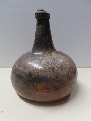 Lot 33 - A BOTTLE OF WINE FROM THE DUTCH EAST INDIAMAN 'VLIEGEND HERT', WRECKED IN THE SCHELDT ESTUARY, 1735