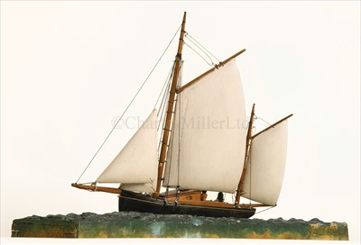 Lot 140 - AN ATTRACTIVE SAILOR'S-TYPE WATERLINE MODEL OF...